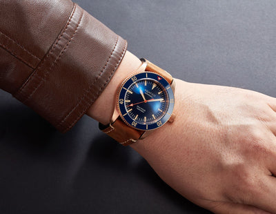 Aquatico Bronze Sea Star Blue Ceramic Bezel No Date